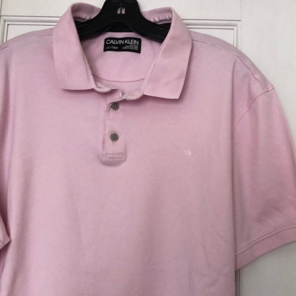 New men’s shirt by Calvin Klein. Made in Sri Lanka. Color pink .